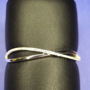 Elegant Silver Crossover Bracelet